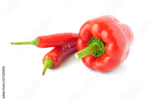Red paprika and sweet pepper isolated on white background
