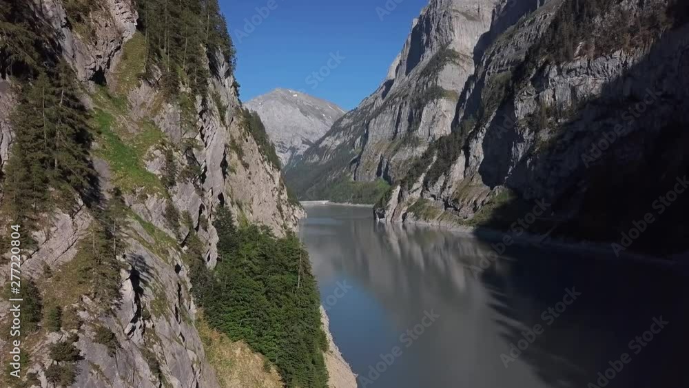 Aerial panorama of narrow mountain lake Gigerwaldsee in the Canton of St. Gallen, Switzerland. Aerial panorama of narrow mountain lake Gigerwaldsee in the Canton of St. Gallen, Switzerland.