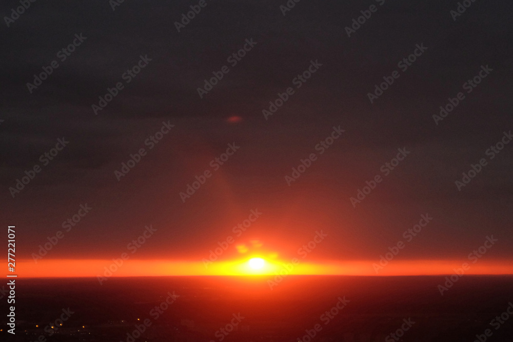 Obraz premium Sunset sky stratosphere background, pictured from plane.