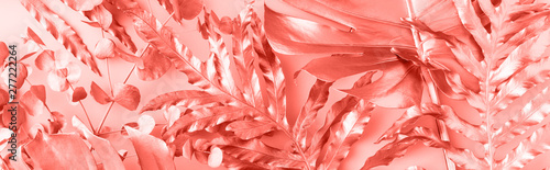 Flat lay of golden pink tropical leaf design elements. Decoration elements fo...