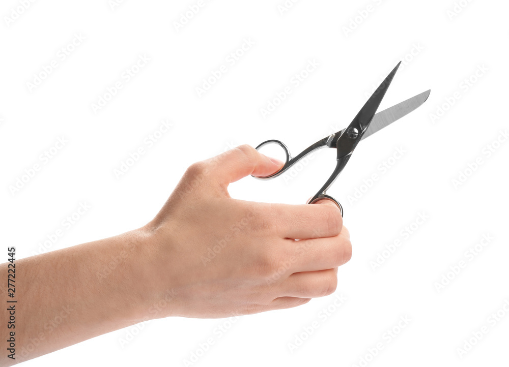Woman holding scissors on white background, closeup Woman holding scissors on white background, closeup