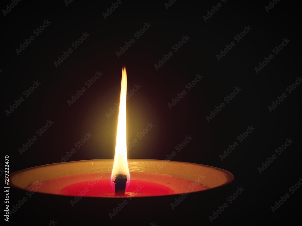 Fototapeta premium candle in the dark
