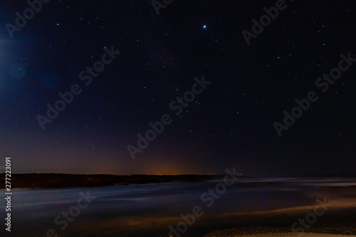 Night photography of the shore at Vila Nova de Milfontes, Portugal