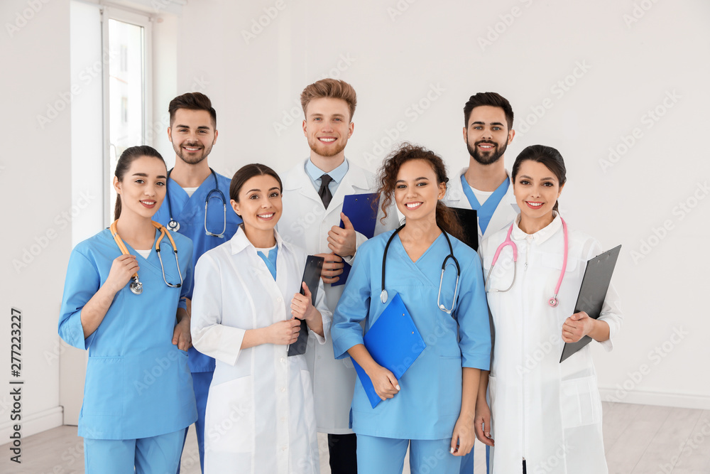 Team of medical workers in hospital. Unity concept Team of medical workers in hospital. Unity concept