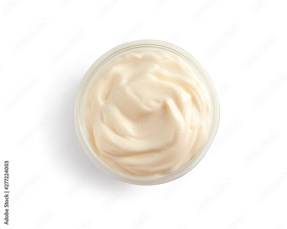 Delicious mayonnaise sauce in bowl on white background, top view Delicious mayonnaise sauce in bowl on white background, top view