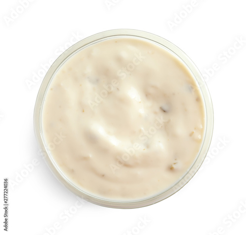 Delicious sauce in bowl on white background, top view