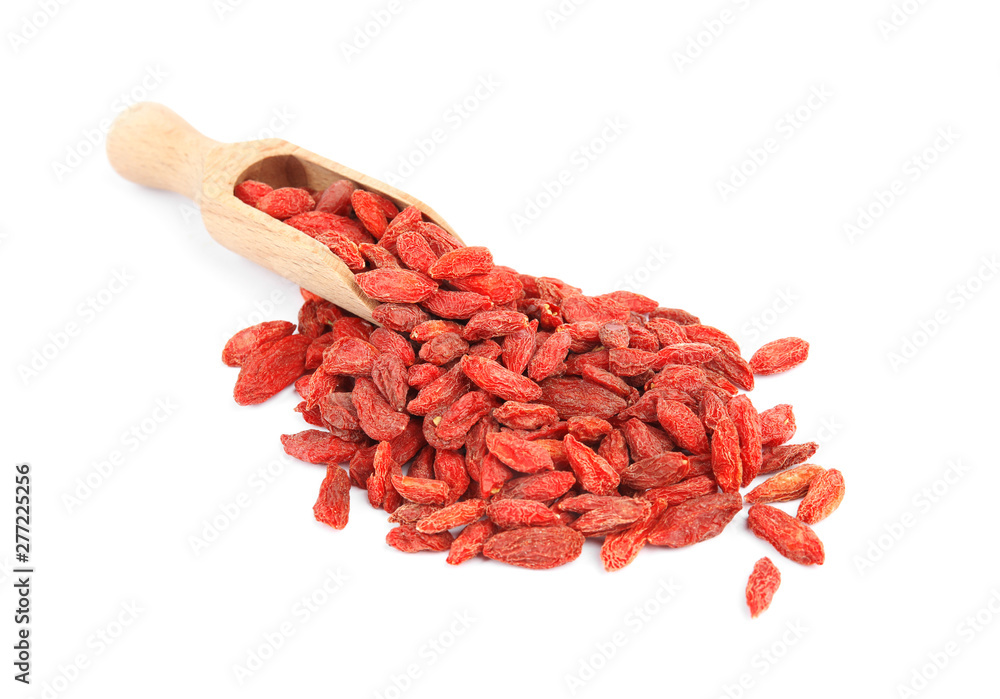 Wooden scoop with dried goji berries on white background Wooden scoop with dried goji berries on white background