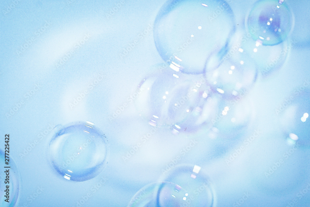 Beautiful abstract close up color white and blue soap bubbles background and wallpaper