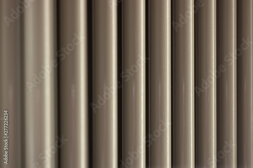 gray pipes background with shallow depth of field