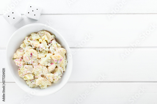 Canvas Print Fresh homemade vegetarian potato salad made with red onion, pickles, mayonnaise