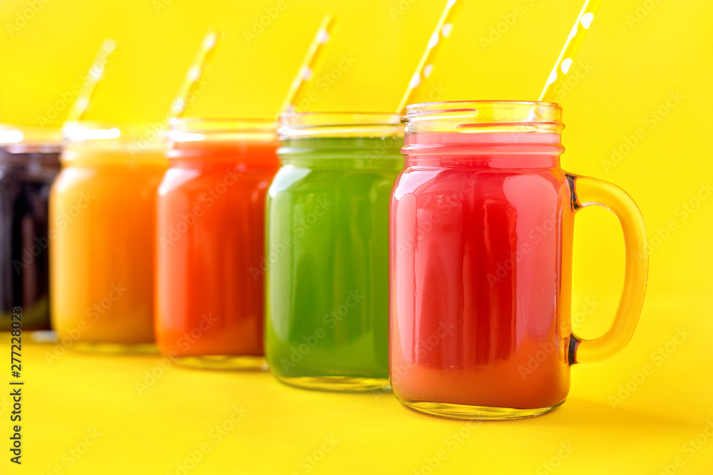 Fresh purple green yellow orange red e in jar Fresh purple green yellow orange red e in jar