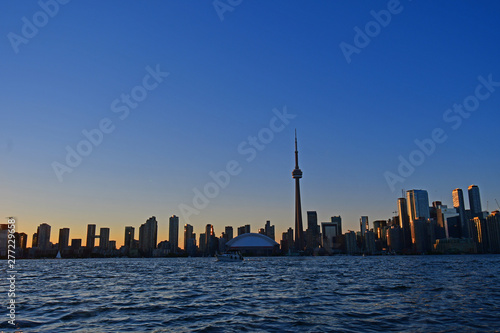 Skyline of Toronto, Canada as seen from the harbor on a summer evening