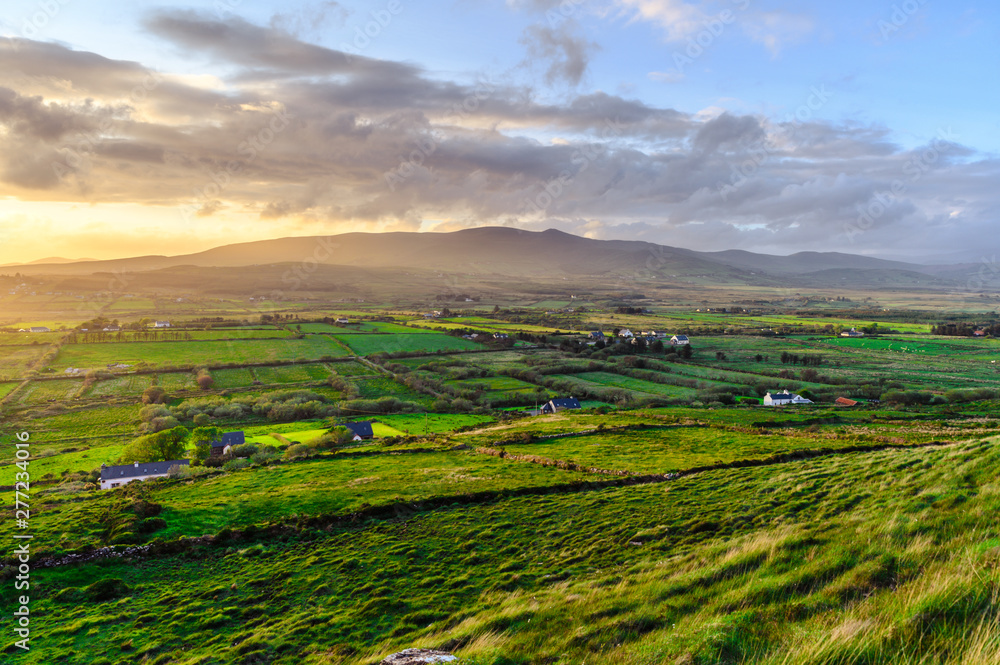 rural landscape with green fields and hills