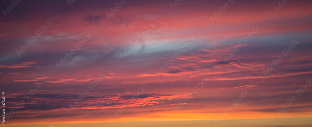 Panorama of a textured purple sky at sunset