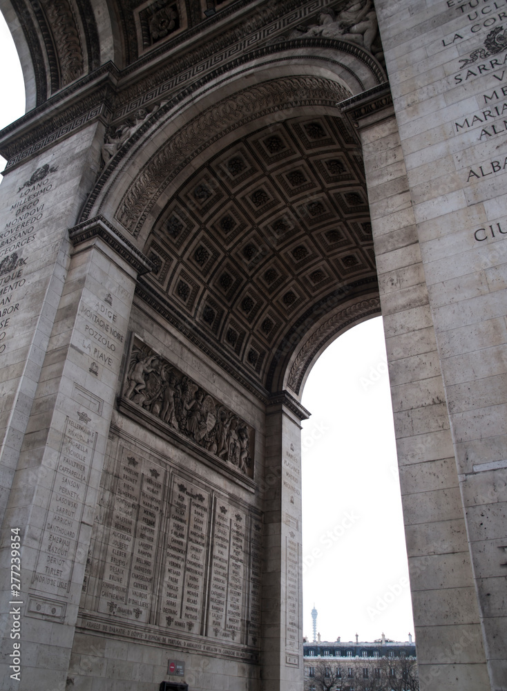 Paris, France, February 22, 2013:  Detais of the Arc de Triomphe on a cloudy day, Paris,