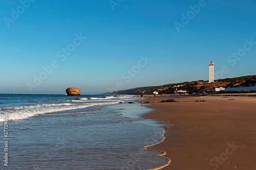 Obraz w ramie Matalascañas beach with the lighthouse and the Higuera tower, Spain, Europe
