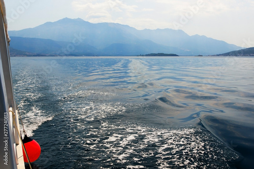 Sea and mountains in the evening light. Tourism on the Adriatic by ship