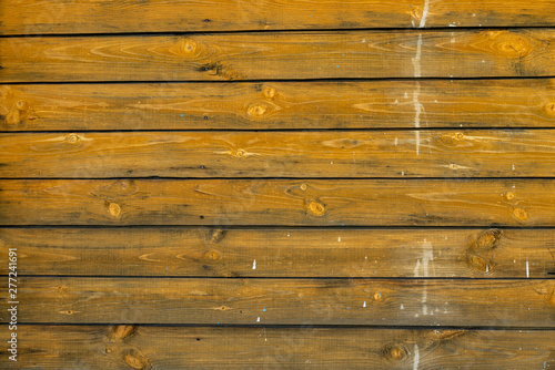 Wooden wall texture background old yellow paint