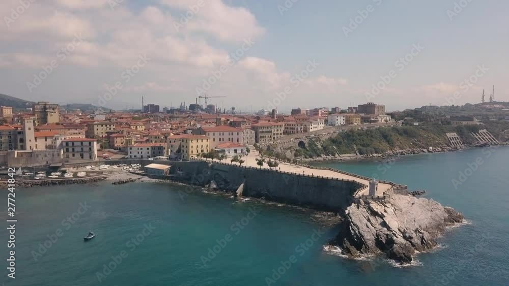 Aerial view of the coast of Piombino. Flying over the pier.. Maremma Tuscany Italy Aerial view of the coast of Piombino. Flying over the pier.. Maremma Tuscany Italy