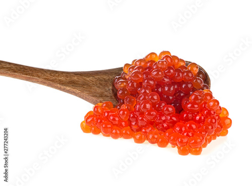 Red salted caviar with wooden spoon on white background