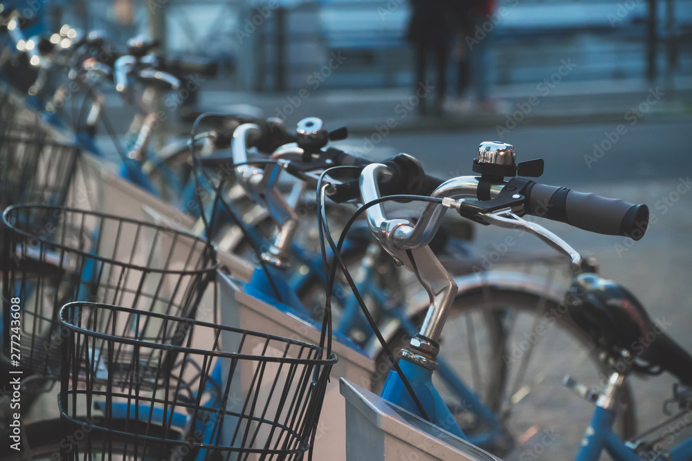 Row of city bicycles for rent. Row of city bicycles for rent.