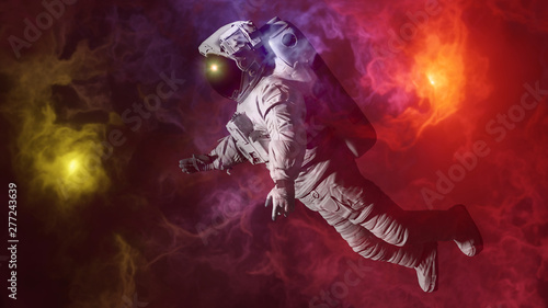 astronaut in colorful nebula