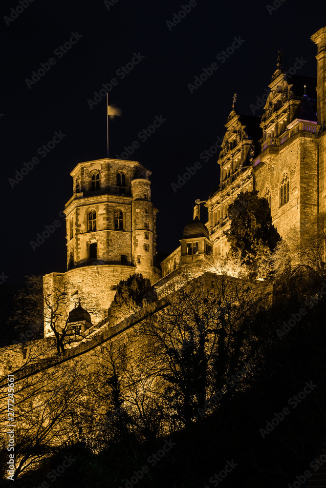 ancient heidelberg castle on hilltop at night