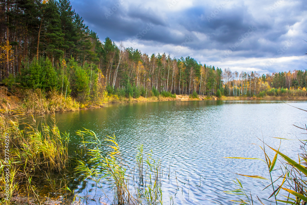 Beautiful forest lake old quarry rainy and gloomy autumn day Beautiful forest lake old quarry rainy and gloomy autumn day