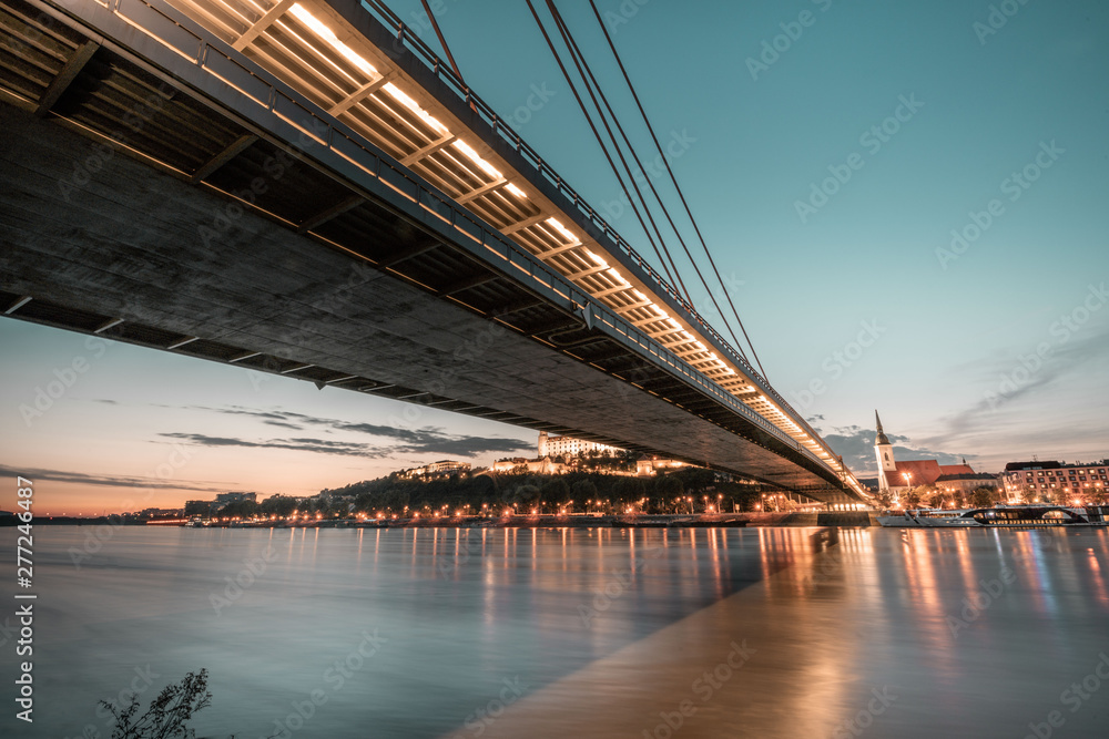 Fototapeta premium Panorama of Sunset over Danube River - Bratislava, Slovakia