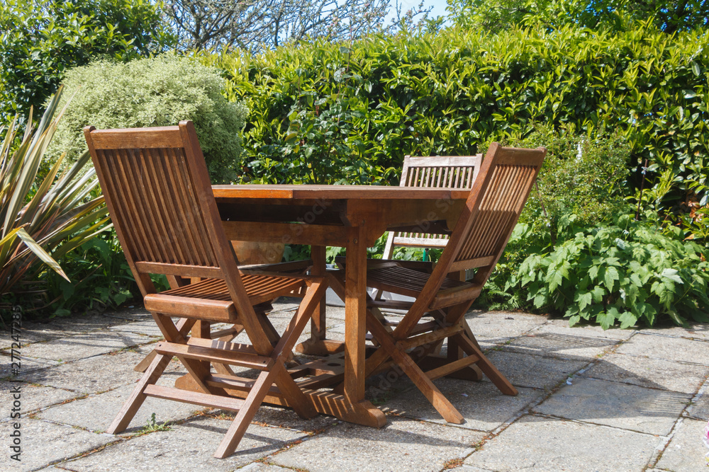 Terrace and wooden garden furniture during spring