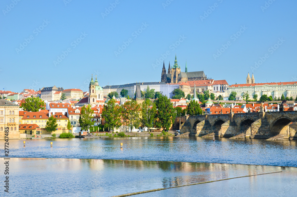 Stunning cityscape of Prague, Bohemia, Czech Republic photographed with dominant Prague Castle and Charles Bridge. The beautiful historical center is along the Vltava River. Cities, Europe
