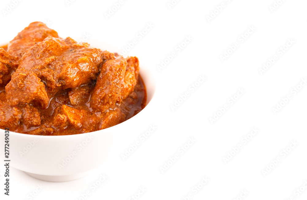 Creamy Tomato Based Chicken Tikka Massala Isolated on a White Background