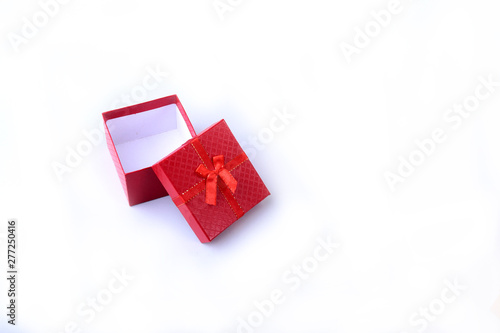 Open gift boxes with bow on wood background. Christmas Decoration