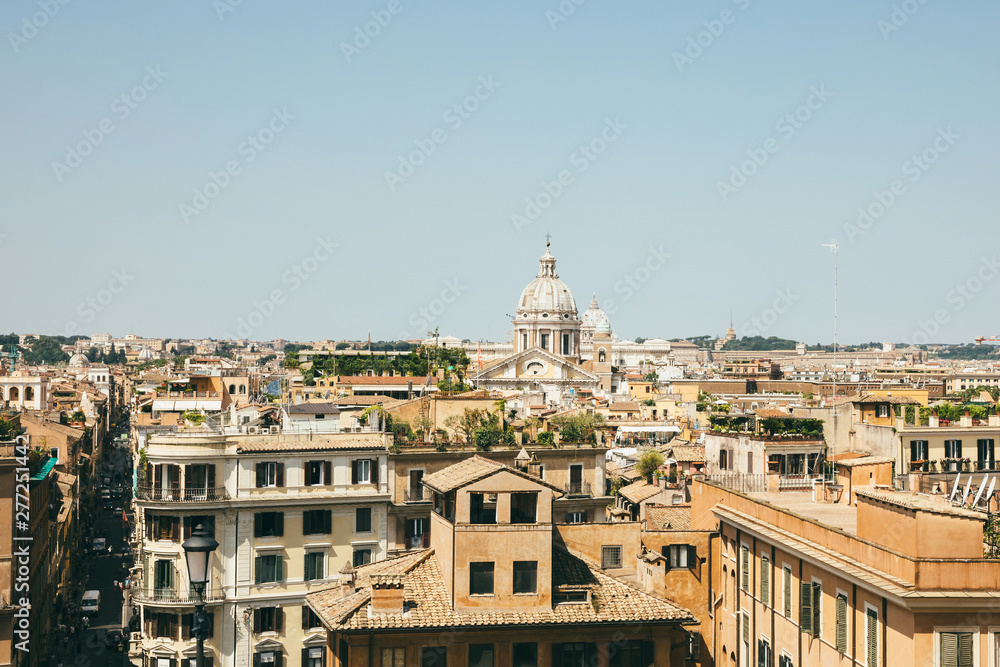 Panoramic view of city Rome with old houses from the Spanish steps