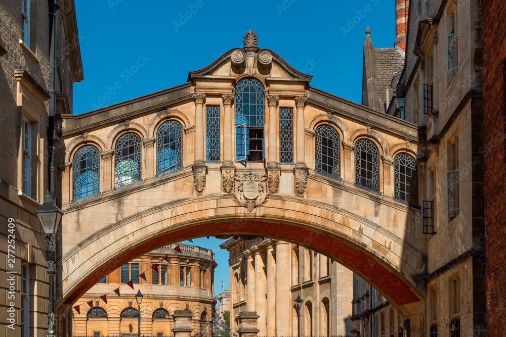 Close-up of the Hertford Bridge, known as the Bridge of Sighs against a clear sky. This is the skyway connecting the two parts of Hertford College on New College Lane in Oxford, England, UK, Europe.