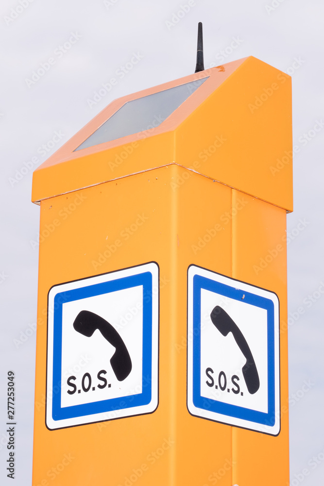 Emergency telephone sign with solar cell Stock Photo | Adobe Stock