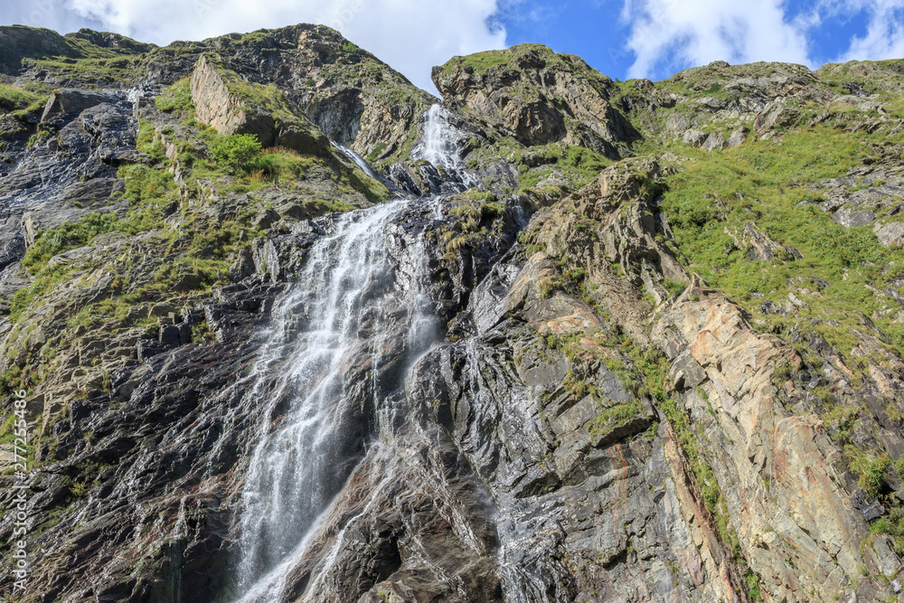 Panorama view of waterfall scene in mountains, national park of Dombay, Caucasus Panorama view of waterfall scene in mountains, national park of Dombay, Caucasus
