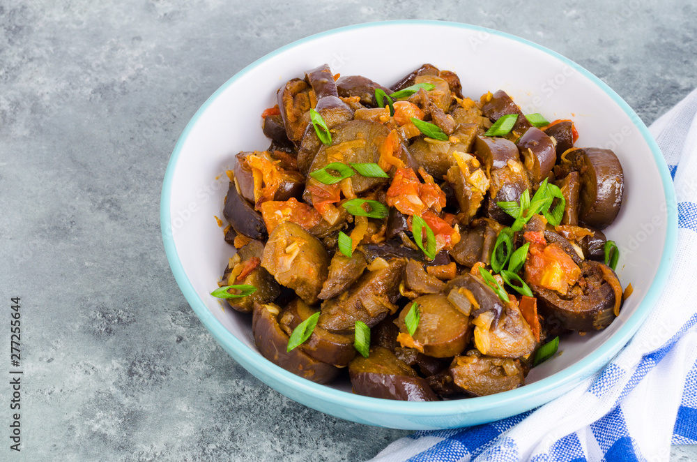 Vegetarian dish, stewed vegetables with eggplants. Vegetarian dish, stewed vegetables with eggplants.