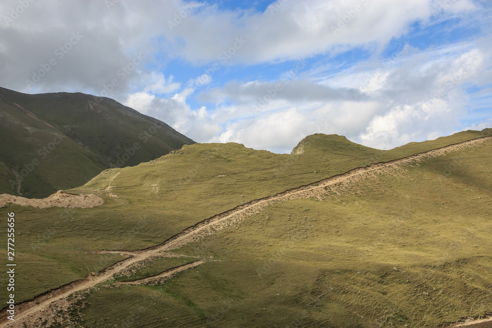 Panorama of road in mountains of national park Dombay, Caucasus