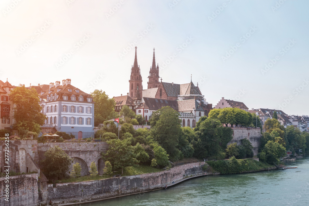 View on Basel city and river Rhine, Switzerland. People swim in water