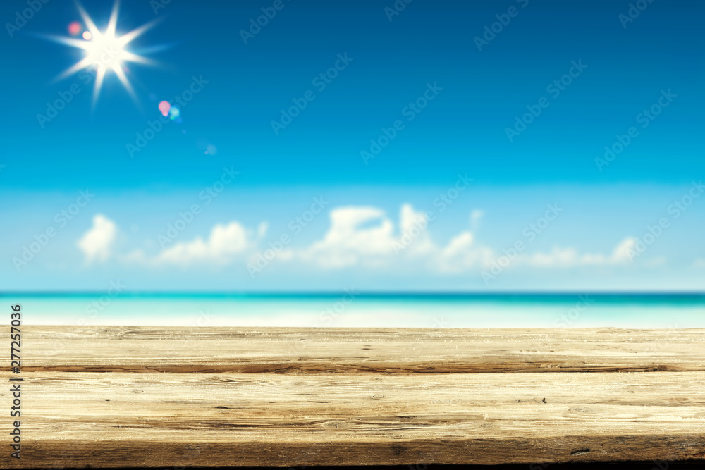 Fototapeta premium Desk of free space and summer beahc
