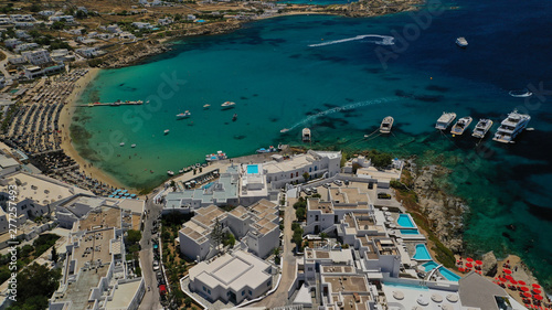 Aerial drone, bird's eye view photo of famous beach of Platy Gialos, Mykonos island, Cyclades, Greece photo