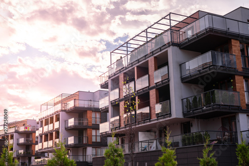 Modern beautiful luxury apartments at sunset.