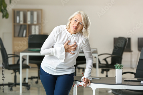 Mature woman suffering from...