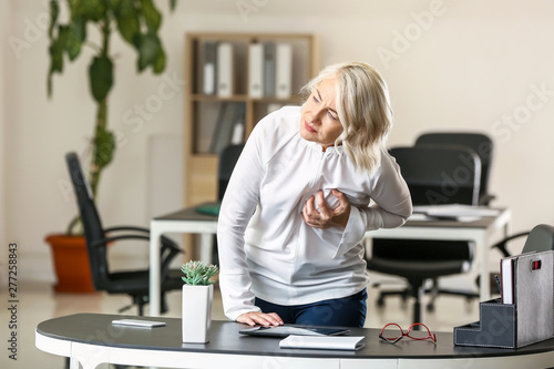 Mature woman suffering from...