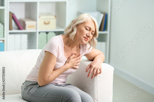 Mature woman suffering from...