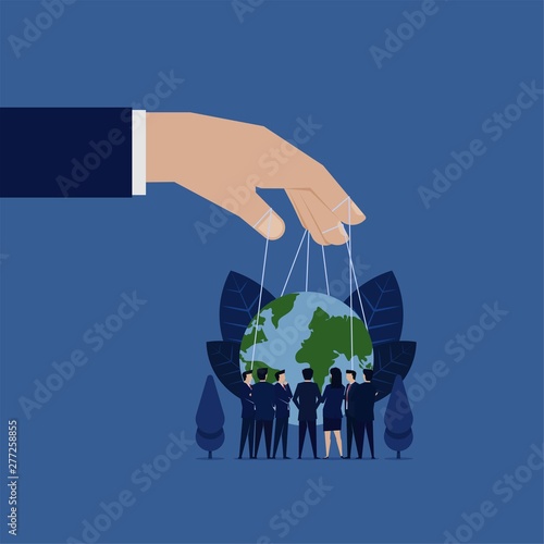 Business meeting to rule world hand hold globe with string puppet.