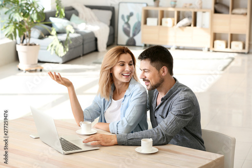Happy couple in love using ...