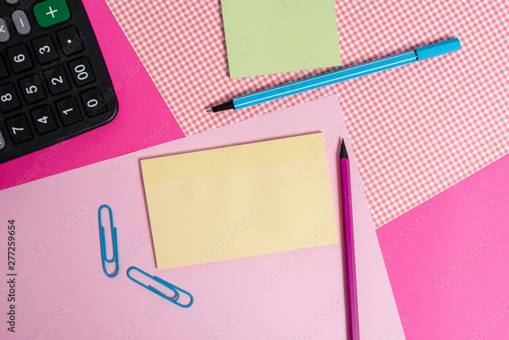 writing equipments with stationary and plain note paper placed on the table writing equipments with stationary and plain note paper placed on the table