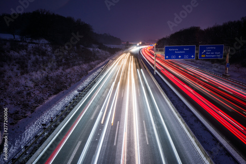 Freeway at night high traffic on lanes